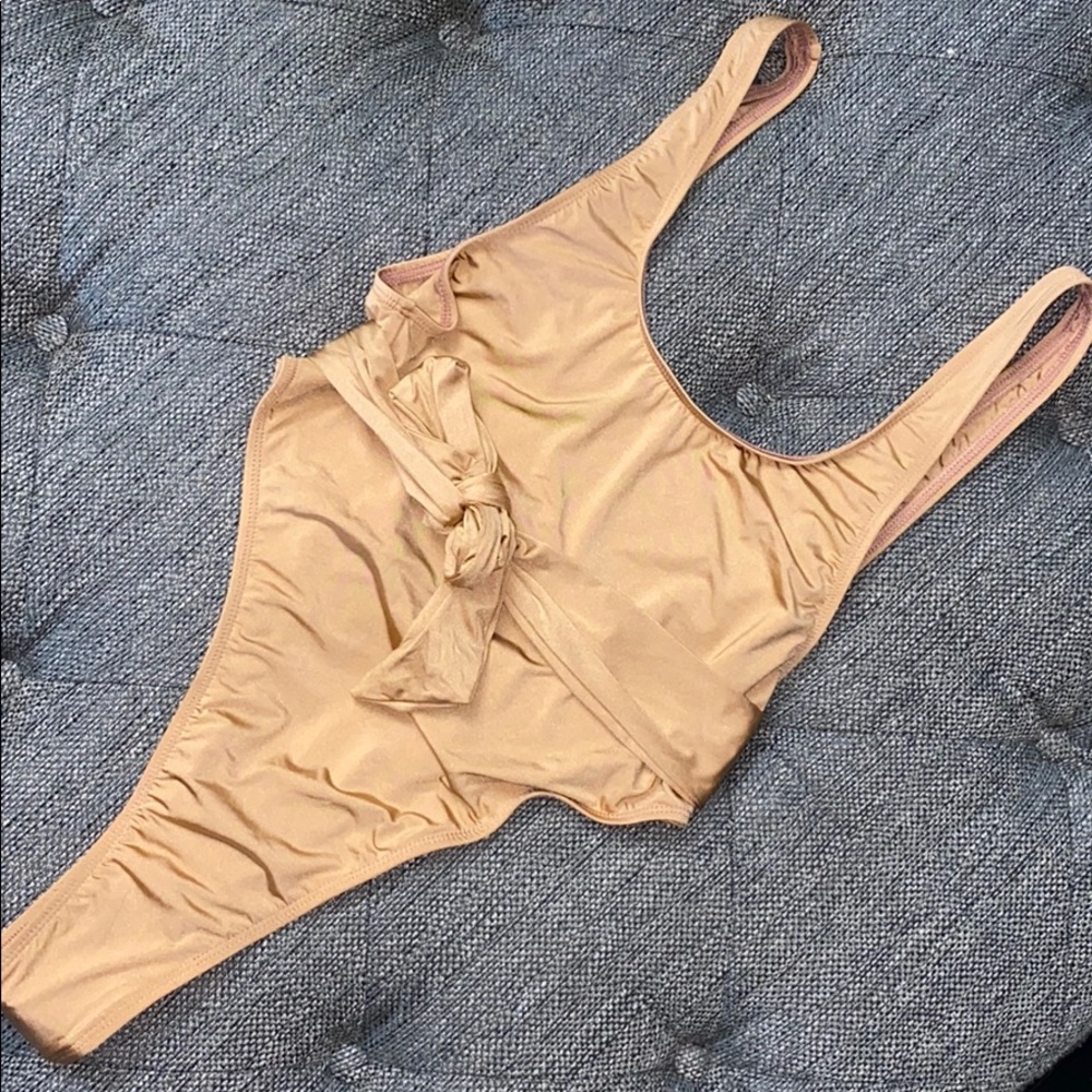 Nude one piece